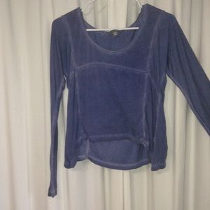Blue long sleeve top. Longer in back